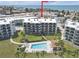 Aerial view shows the desirable location near the beach and close proximity to the intercoastal at 9815 Harrell Ave # 502, Treasure Island, FL 33706
