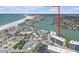 Lovely aerial view shows the property's beachside location and the intercoastal waterways at 9815 Harrell Ave # 502, Treasure Island, FL 33706