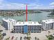 Stunning waterfront condo complex on the water with beautiful bay views and a modern design with palm trees at 9815 Harrell Ave # 502, Treasure Island, FL 33706