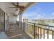 Charming balcony with ceiling fans offers a relaxing spot to take in the waterfront views at 9815 Harrell Ave # 502, Treasure Island, FL 33706