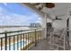 This waterfront balcony offers a relaxing spot to enjoy breathtaking views and cooling breezes at 9815 Harrell Ave # 502, Treasure Island, FL 33706