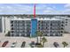 The condos boast a clean design with a beautiful aqua accent and private balconies at 9815 Harrell Ave # 502, Treasure Island, FL 33706