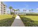 The landscaped grounds offer manicured landscaping and a nice walking path to the pool at 9815 Harrell Ave # 502, Treasure Island, FL 33706