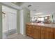 Open-concept kitchen with bar seating adjacent to the dining and living areas, featuring ample storage at 9815 Harrell Ave # 502, Treasure Island, FL 33706