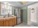 Kitchen featuring stainless steel refrigerator, sink, and wood cabinets at 9815 Harrell Ave # 502, Treasure Island, FL 33706