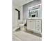Bathroom with a stylish vanity, modern fixtures, and a walk-in shower at 1002 E North Bay St, Tampa, FL 33603