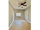 Bedroom with natural light, ceiling fan, and a closet at 1002 E North Bay St, Tampa, FL 33603