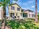 Enjoyable backyard featuring a spacious patio, perfect for outdoor dining and entertaining with a lush lawn at 10501 Dotham Ct, Tampa, FL 33626