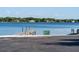 View of the boat ramp with gated access to the lake, offering convenience for boating enthusiasts at 10609 Orange Grove Dr, Tampa, FL 33618