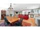 Open-concept kitchen and dining room with large island and pendant lighting at 10609 Orange Grove Dr, Tampa, FL 33618