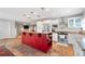 Expansive kitchen with a red island, stainless steel appliances, modern lighting, and an open layout for easy entertaining at 10609 Orange Grove Dr, Tampa, FL 33618