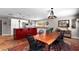Spacious kitchen with stainless steel appliances, white cabinetry, and island with seating at 10609 Orange Grove Dr, Tampa, FL 33618