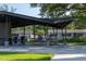 Community picnic shelter with tables and shade, offering an outdoor space for gatherings and enjoying the neighborhood at 10609 Orange Grove Dr, Tampa, FL 33618