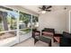 Cozy screened patio with outdoor furniture and view of the backyard at 11841 Whisper Creek Dr, Riverview, FL 33569