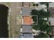 Home in a residential neighborhood beside a long pond and lush trees at 13420 Copper Head Dr, Riverview, FL 33569