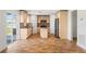 Modern kitchen with stainless steel appliances, center island, and decorative backsplash at 13420 Copper Head Dr, Riverview, FL 33569