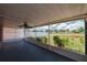 Enclosed lanai with nice views, ceiling fan and tile flooring at 13420 Copper Head Dr, Riverview, FL 33569