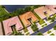 Aerial view showcasing homes with tile roofs near a picturesque lake at 16261 Amethyst Key Dr, Wimauma, FL 33598