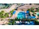 A resort style lap pool with plenty of seating, shade and sun at 16261 Amethyst Key Dr, Wimauma, FL 33598