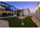 Putting green and patio, perfect for outdoor fun and entertainment at 1698 Eden Ct, Clearwater, FL 33756