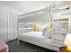 Bunk bed room with natural light and closet space at 1698 Eden Ct, Clearwater, FL 33756