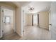 Light-filled bedroom showcases wood floors, neutral walls, and a ceiling fan at 18314 Waydale Loop, Hudson, FL 34667