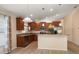 Kitchen with granite countertops, stainless steel appliances, and hardwood floors at 18314 Waydale Loop, Hudson, FL 34667