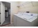 Laundry room with a washer and dryer at 18314 Waydale Loop, Hudson, FL 34667