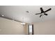 Open living space with a ceiling fan and a chandelier at 18314 Waydale Loop, Hudson, FL 34667