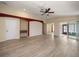 Large living room with hardwood floors and recessed lighting at 18314 Waydale Loop, Hudson, FL 34667