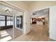 Open floor plan with kitchen view from living room at 18314 Waydale Loop, Hudson, FL 34667