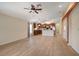 Living room with hardwood floors and a view of the kitchen at 18314 Waydale Loop, Hudson, FL 34667