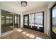 Cozy sun room with sliding glass doors at 18314 Waydale Loop, Hudson, FL 34667