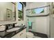 Updated bathroom features a black granite countertop, shower with a view, and modern fixtures at 18483 Purple Creek Ln # Lot 1, Lutz, FL 33549