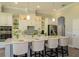 Modern kitchen with stainless steel appliances, a large island and white cabinetry at 18483 Purple Creek Ln # Lot 1, Lutz, FL 33549