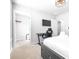 Bedroom with view to walk in closet and desk at 19195 Blue Pond Dr, Lutz, FL 33558