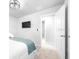 Modern bedroom with tv and closet at 19195 Blue Pond Dr, Lutz, FL 33558