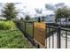 Parkview community dog park with lush greenery and fence at 19195 Blue Pond Dr, Lutz, FL 33558