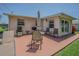 Outdoor patio area with furniture, grill, and access to backyard at 2051 Lyra Dr, Holiday, FL 34690