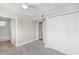 This bedroom has plush carpeting, closet space, and an ensuite bathroom with shower and tub at 21042 Gladis Ave, Port Charlotte, FL 33952