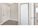 This carpeted bedroom has a closet for storage at 21042 Gladis Ave, Port Charlotte, FL 33952