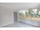 Enclosed bonus room has exterior access and screened windows that offer lots of natural light at 21042 Gladis Ave, Port Charlotte, FL 33952
