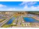 Waterfront townhome featuring a prime location with community amenities, walking trails, and easy access to shopping at 2265 Alee Ln, Wesley Chapel, FL 33543