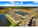 Waterfront townhome with an open floor plan, modern finishes, and convenient access to community amenities and shopping at 2265 Alee Ln, Wesley Chapel, FL 33543