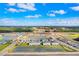 Desirable new townhome boasts serene water views, lush landscaping, and a convenient location in a growing community at 2265 Alee Ln, Wesley Chapel, FL 33543