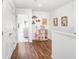 Hallway with wood flooring, neutral walls and decor at 2265 Alee Ln, Wesley Chapel, FL 33543