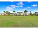Well-maintained community soccer field with a lush green lawn and blue skies at 2265 Alee Ln, Wesley Chapel, FL 33543