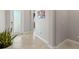 Inviting foyer with natural light, neutral paint, and a glimpse into the home's layout at 2835 Hilliard Dr, Wesley Chapel, FL 33543