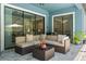 Relaxing patio area with cozy seating, perfect for outdoor entertaining at 2835 Hilliard Dr, Wesley Chapel, FL 33543