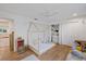 Bedroom with twin-sized bed, closet and ceiling fan at 2969 Talon Dr, Clearwater, FL 33761
